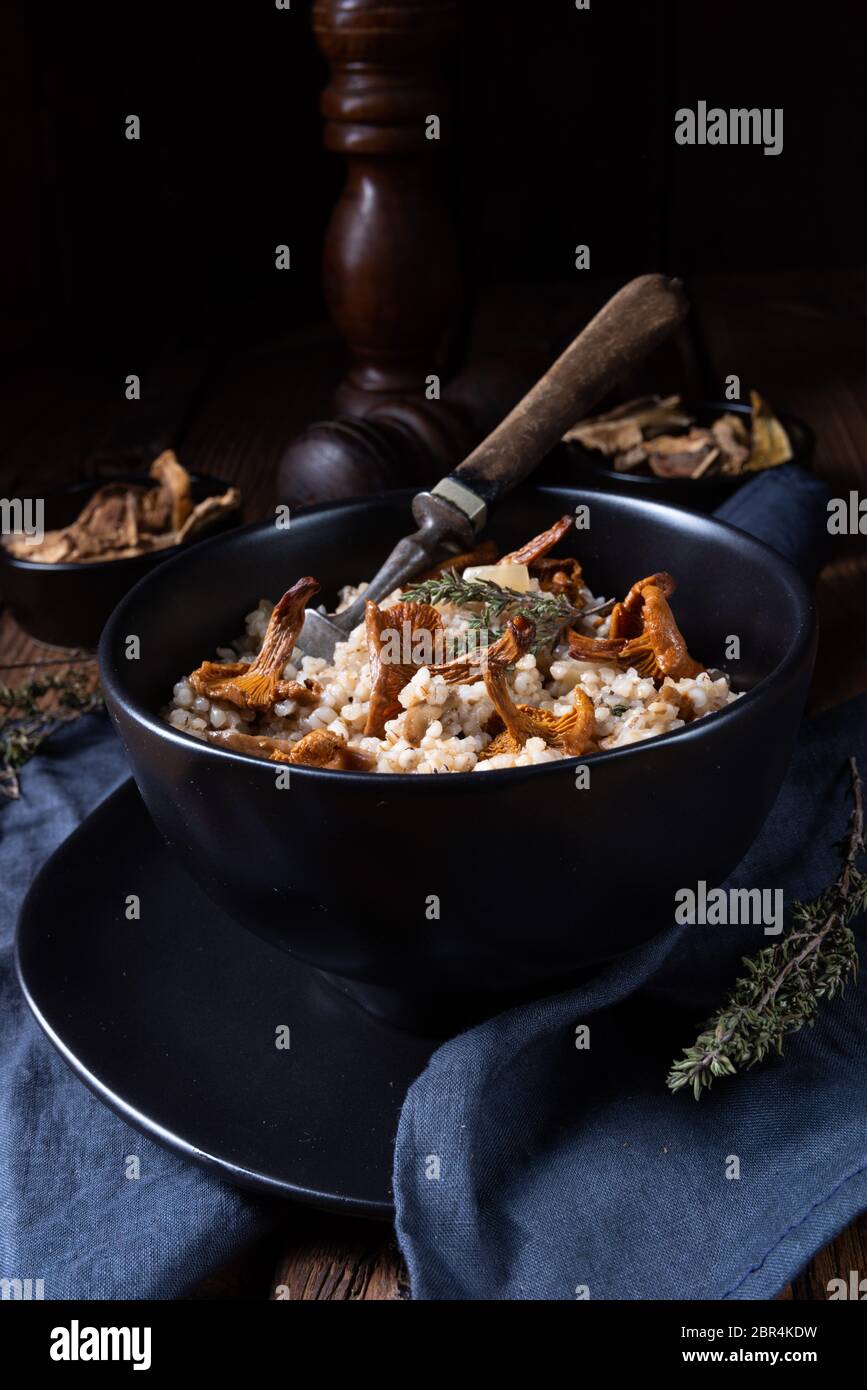 Kaszotto- polish risotto from barley groats with mushrooms Stock Photo ...