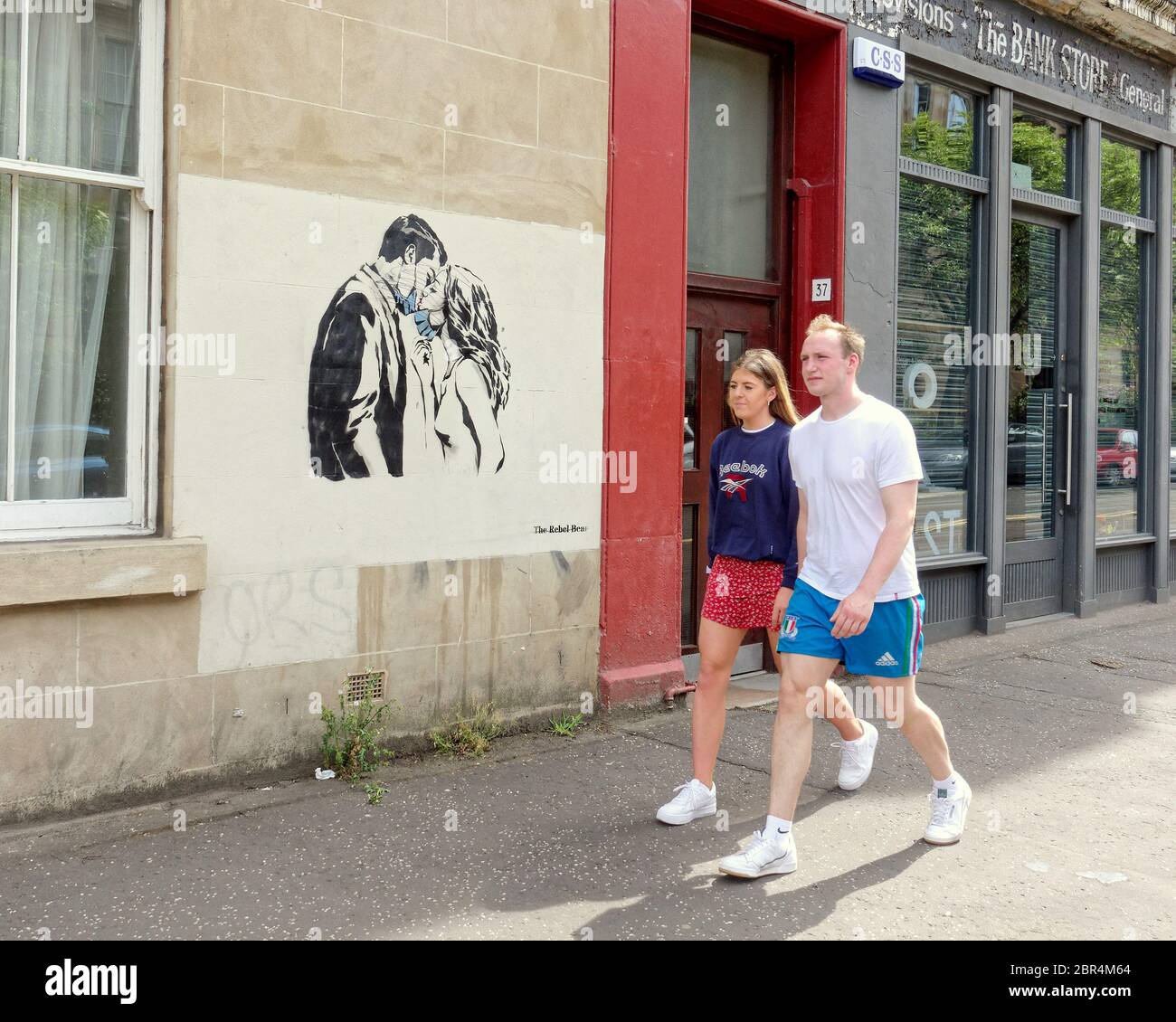 Glasgow, Scotland, UK 20th May, 2020: UK Weather:Sunny day saw people return to the streets and the health service and coronavirus murals of the rebel bear.. Copyrite Gerard Ferry/ Alamy Live News Stock Photo