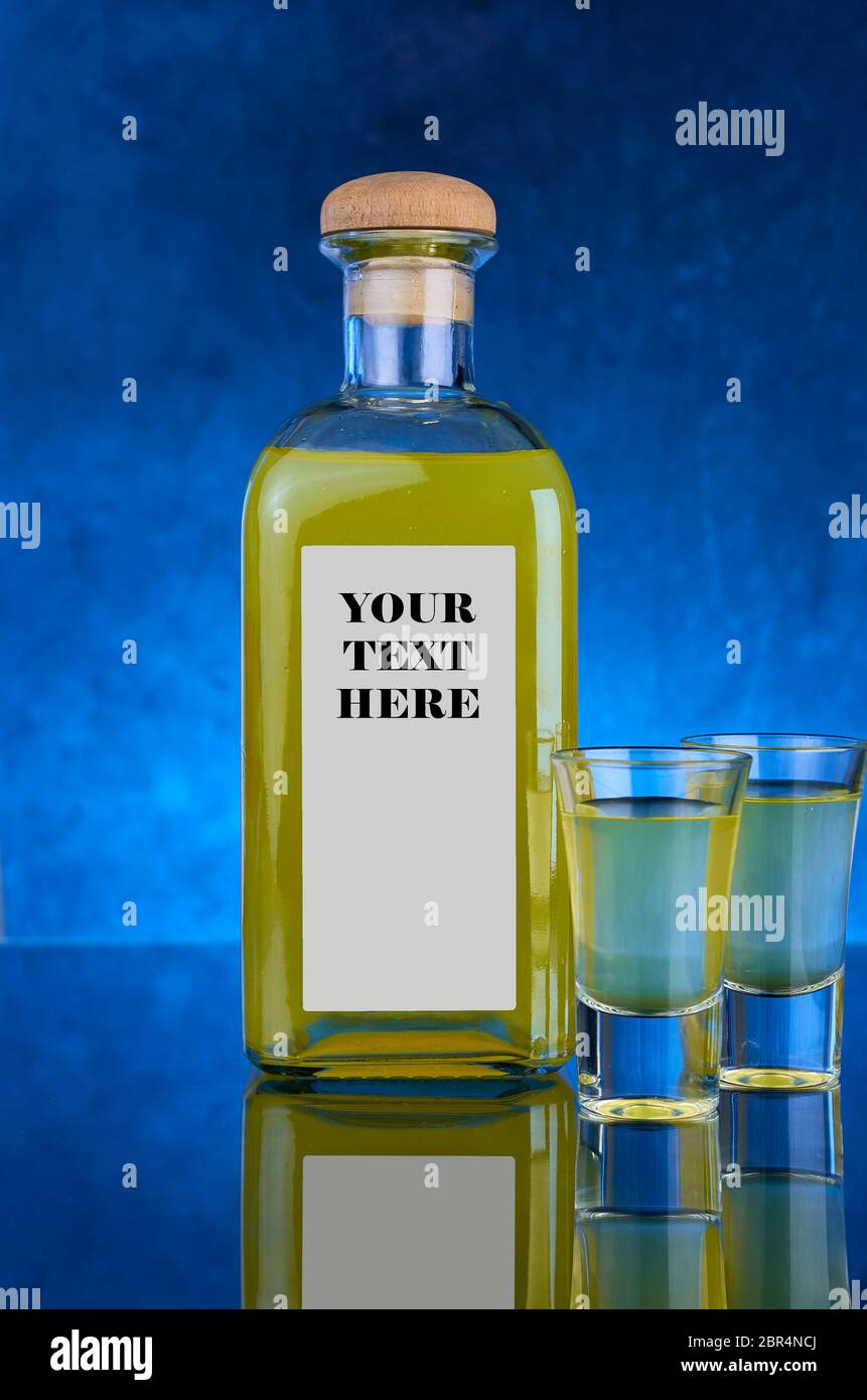 YELLOW LIQUOR BOTTLE AND SHOTS, WITH BLUE BACKGROUND AND LABEL WITH