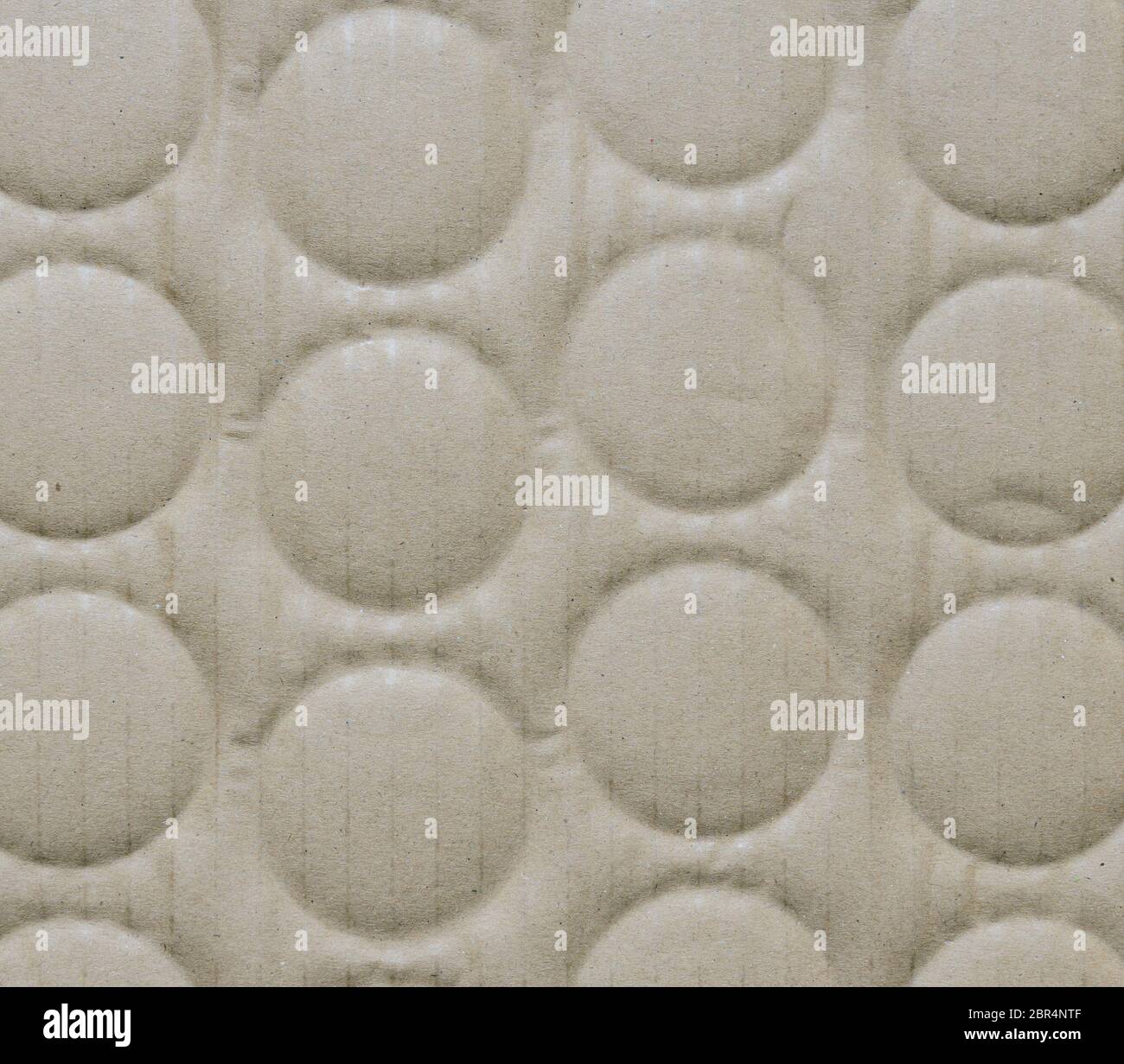 Recycled corrugated cardboard paper texture background with debossed