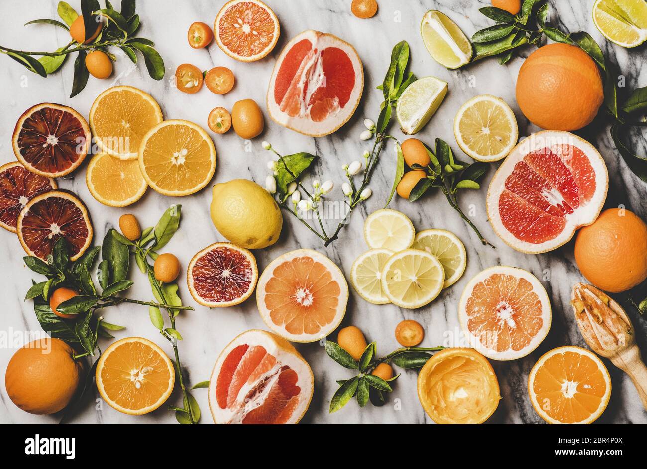 Ingredients For Cooking Citrus Cake Flat Lay Of Fresh Oranges Lemons Kumquats Grapefruits And Blossom Flowers Over Grey Marble Background Top Vie Stock Photo Alamy