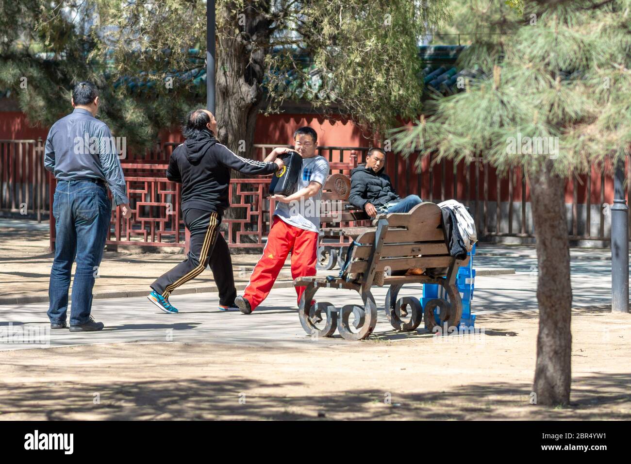 Beijing / China - April 3, 2016: People practicing kung fu in Ritan park in Beijing, China Stock Photo