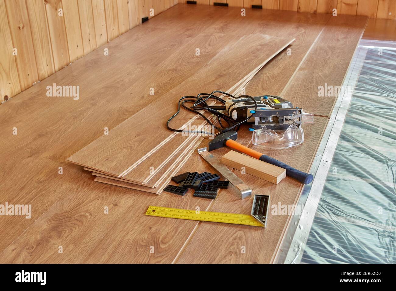 Installation Infrared Carbon Heating Film For Floor Installing Finished Laminate Floor On A Heat Insulated Floor Electrical Floor Heating System R Stock Photo Alamy