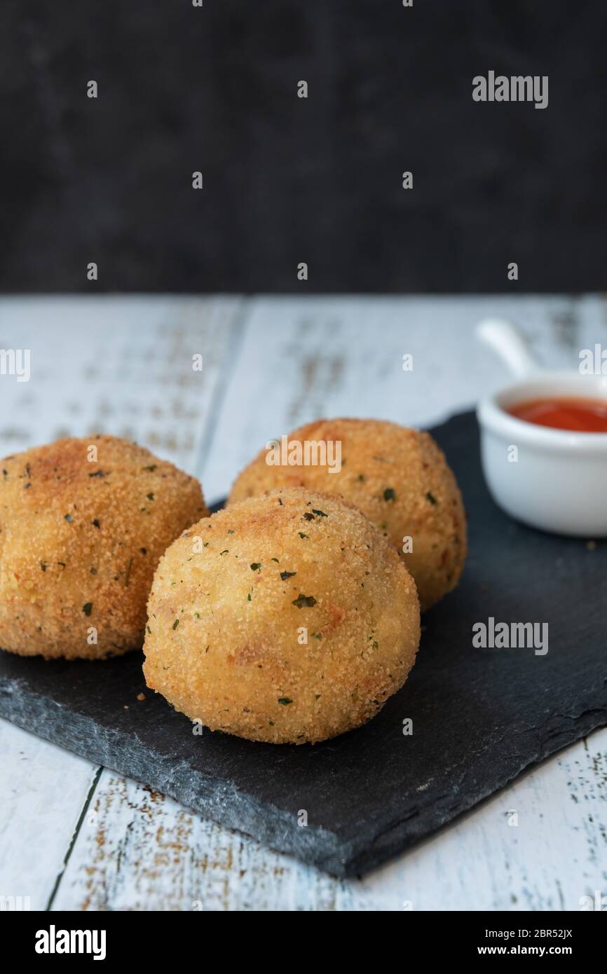 crispy potato balls with tuna and onion Stock Photo Alamy