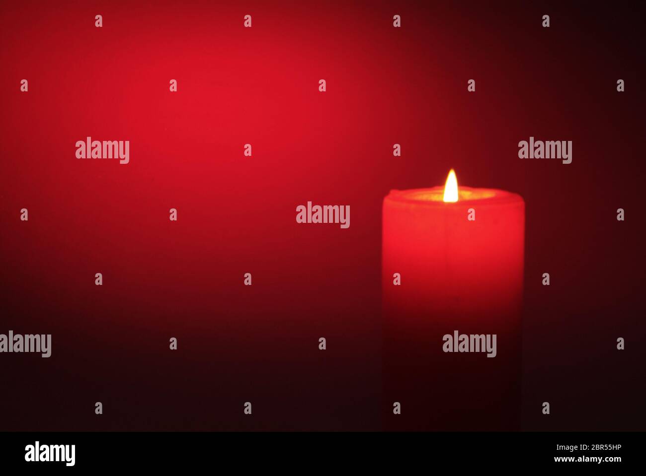 Candles flame close up on a black background Stock Photo - Alamy