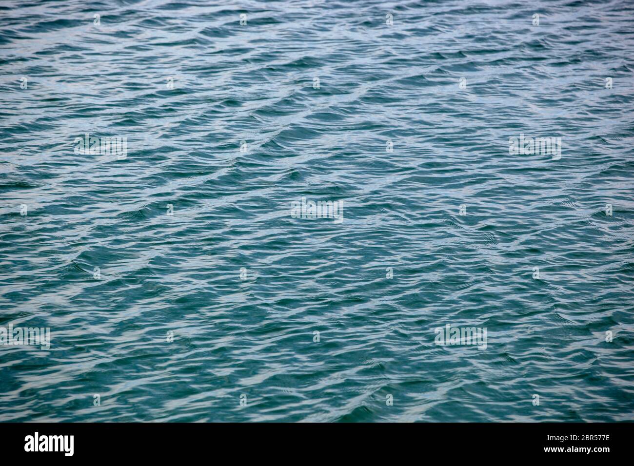 Ripples On Blue Water Surface Stock Photo - Alamy
