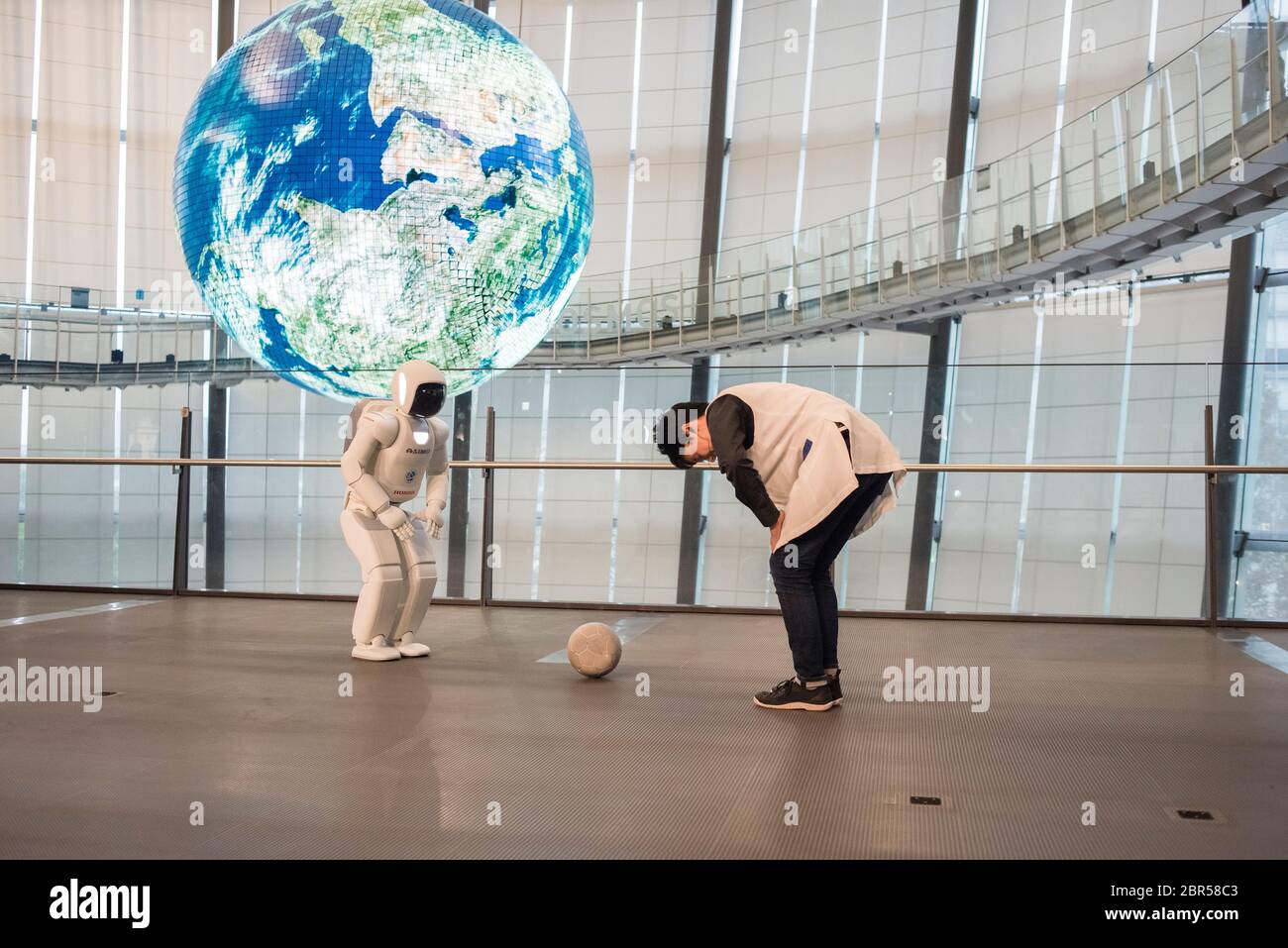 The humanoid robot called Asimo, created by Honda, is performing at the ...