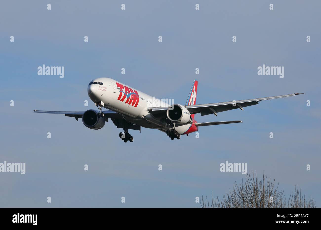 Boeing 777-300 airliner landing at Heathrow airport in the UK. Stock Photo