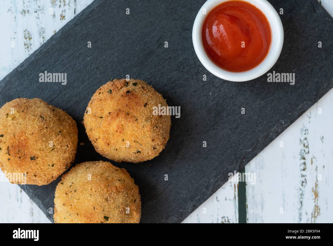 crispy potato balls with tuna and onion Stock Photo Alamy