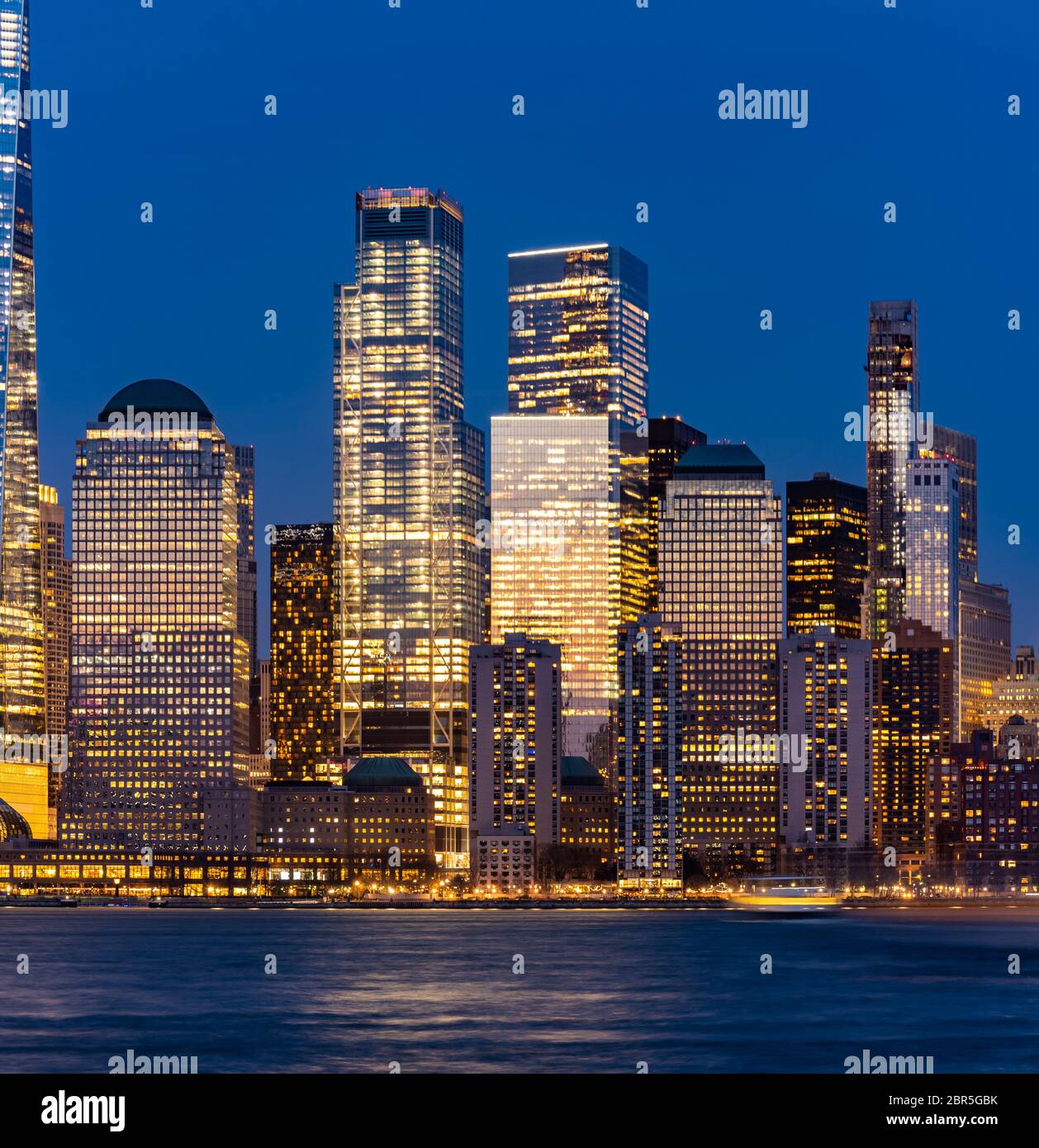 New York city Lower Manhattan skyline cityscape at dusk from New Jersey ...