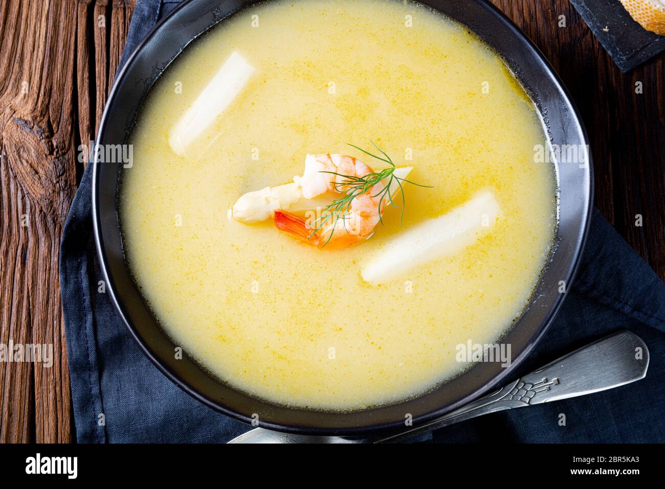 Super delicious asparagus soup with crab and capers Stock Photo - Alamy