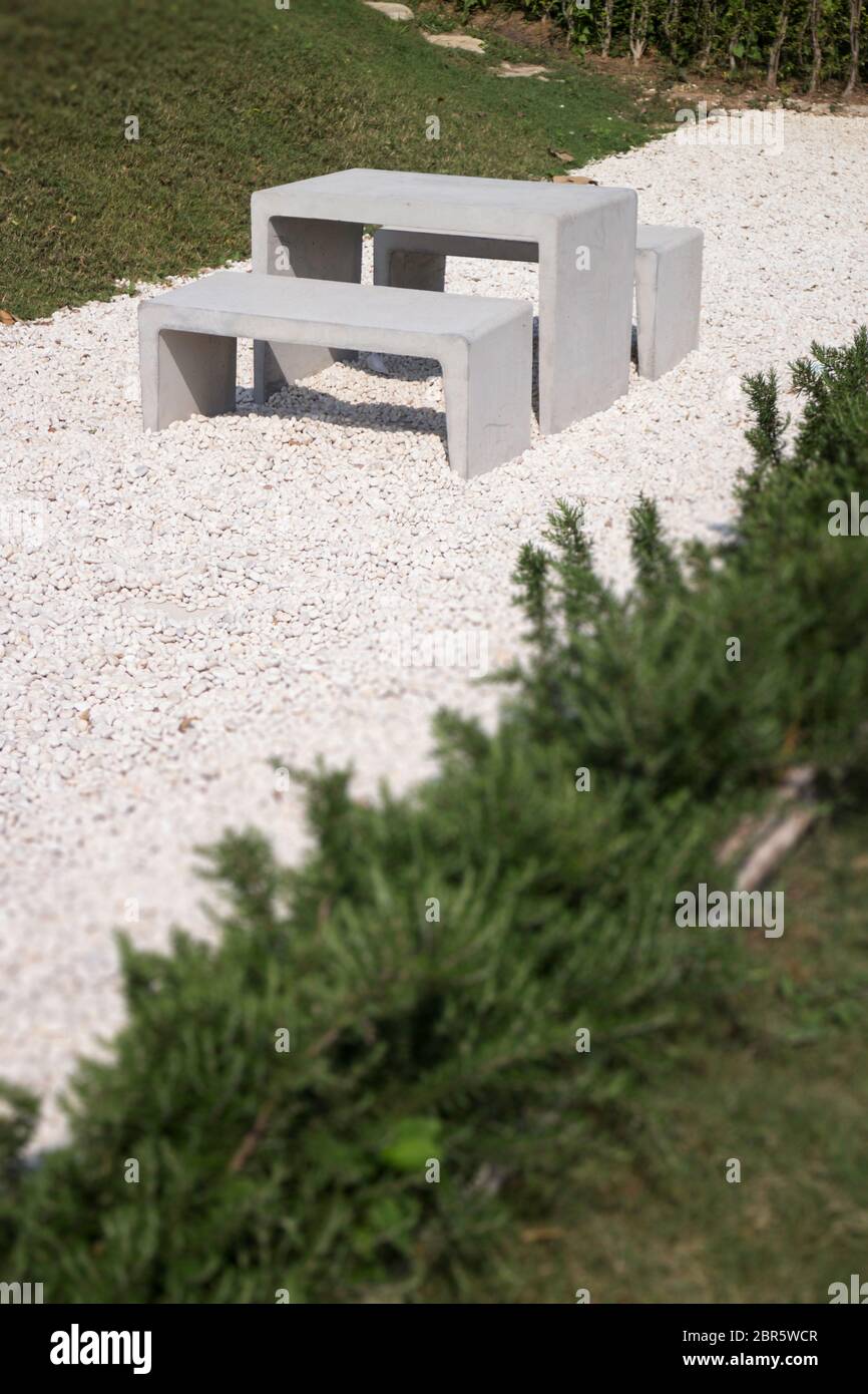 Modern concrete style furniture in outdoor garden, stock photo Stock