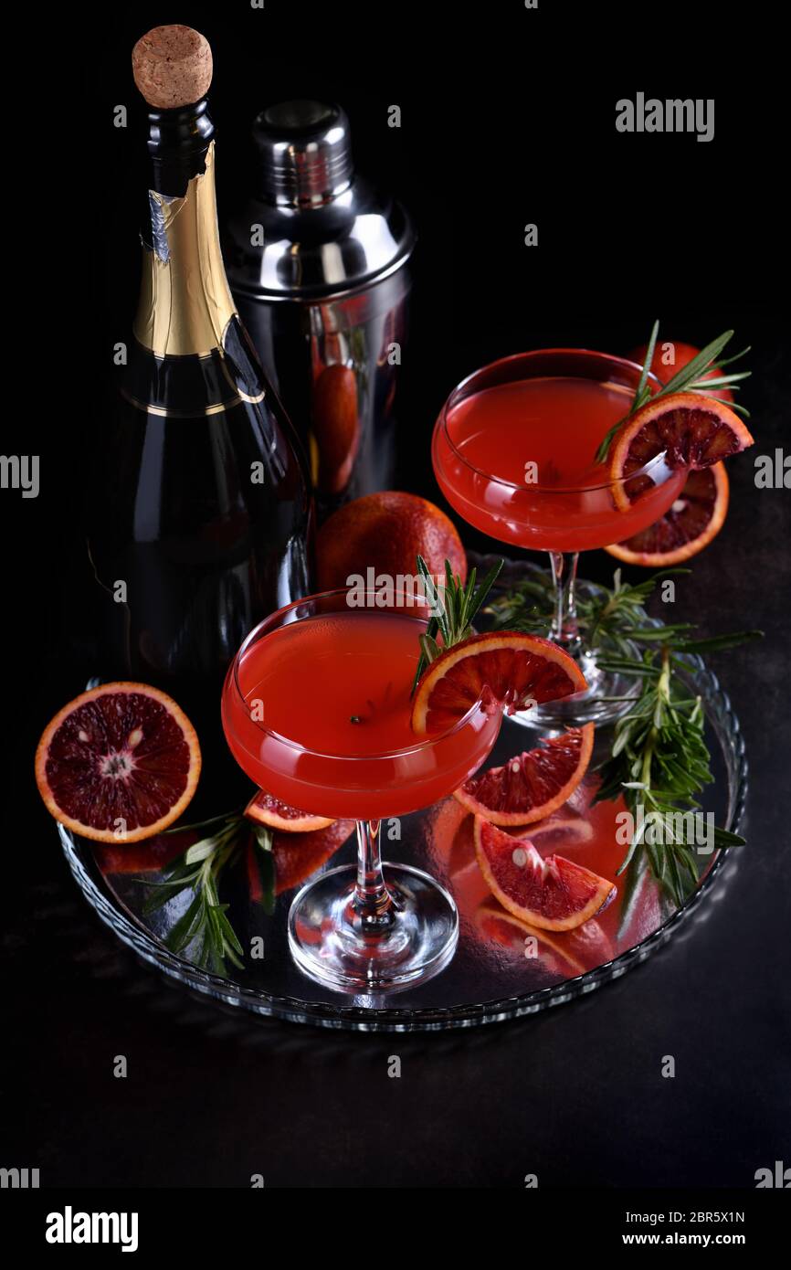 Bloody orange citrus champagne cocktail. Delicious, classy drink that everyone at your party will love Stock Photo