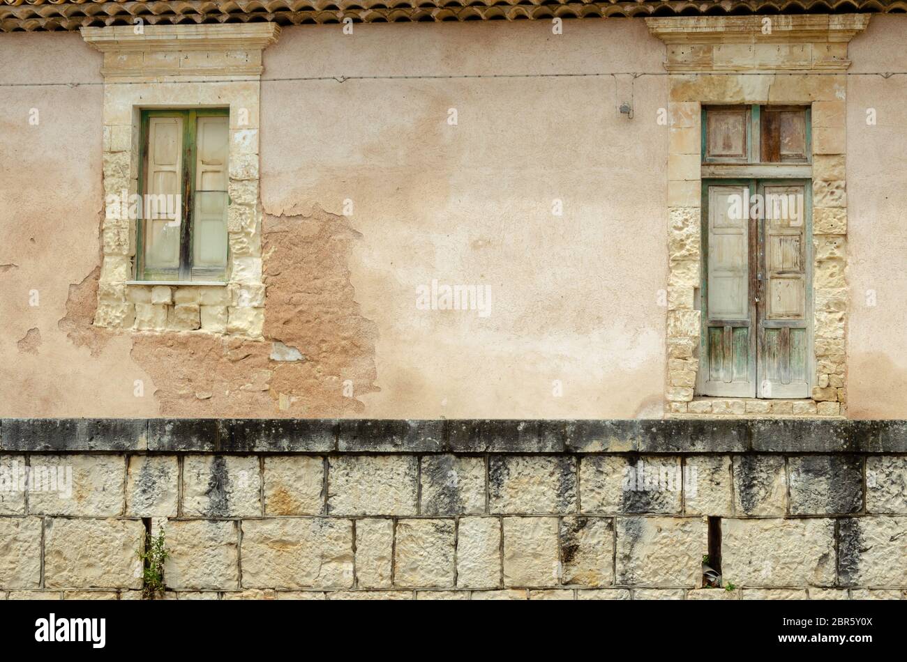The ancient window on stone wall, for background Stock Photo - Alamy