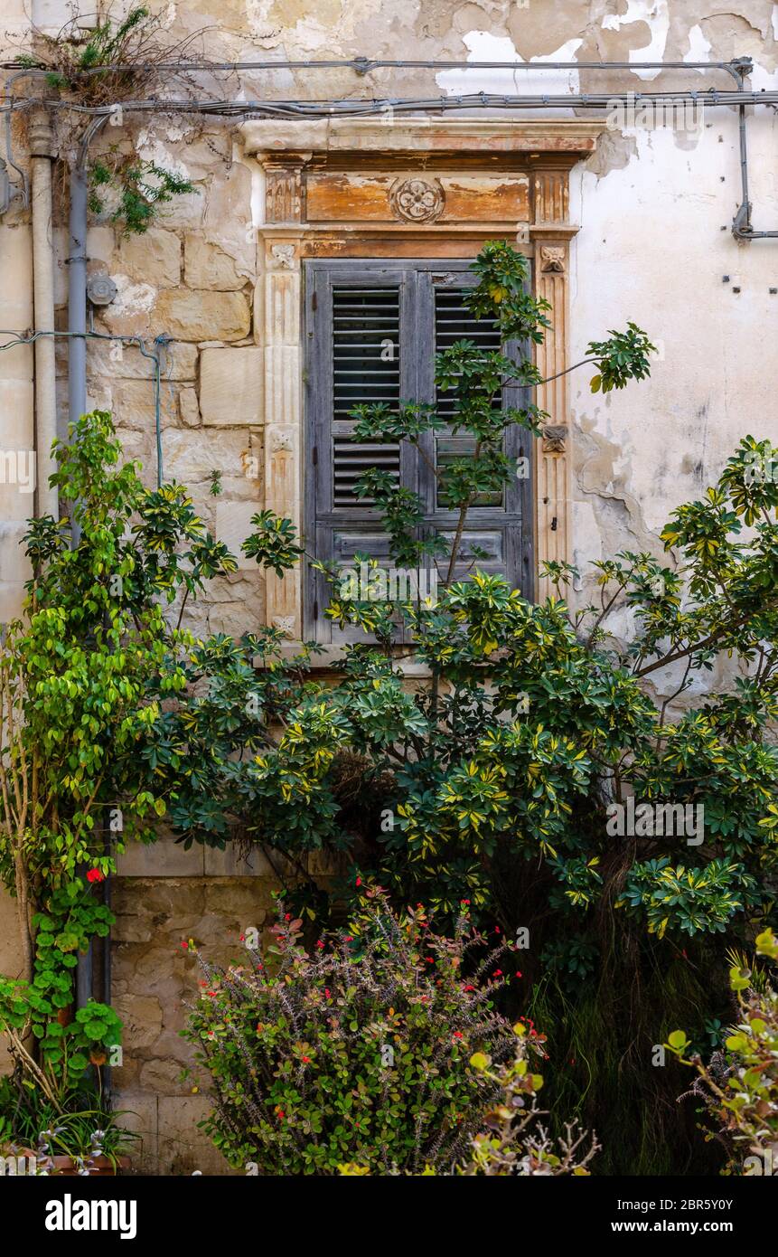The ancient window on stone wall, for background Stock Photo - Alamy
