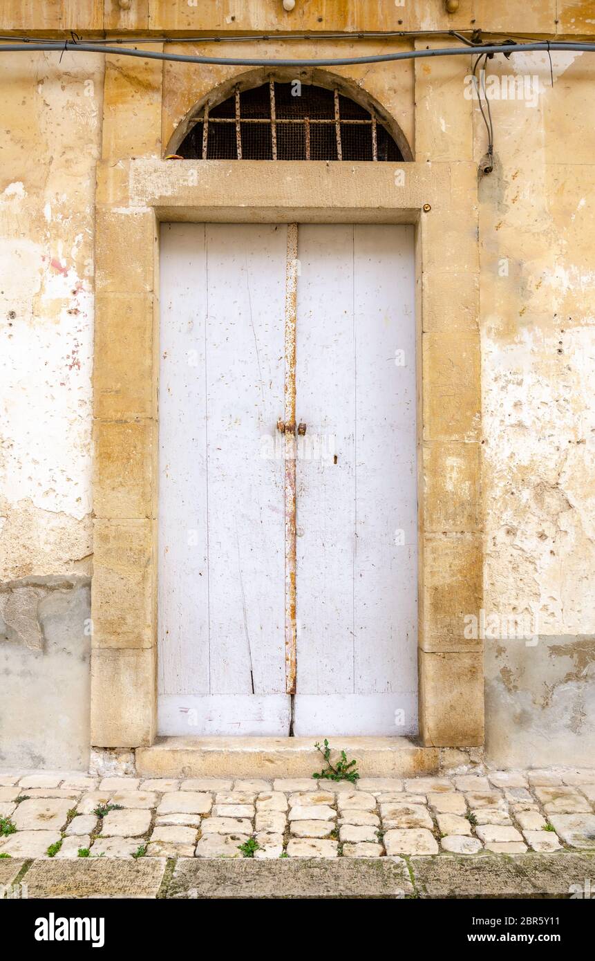 The Ancient door of a Sicilian house Stock Photo