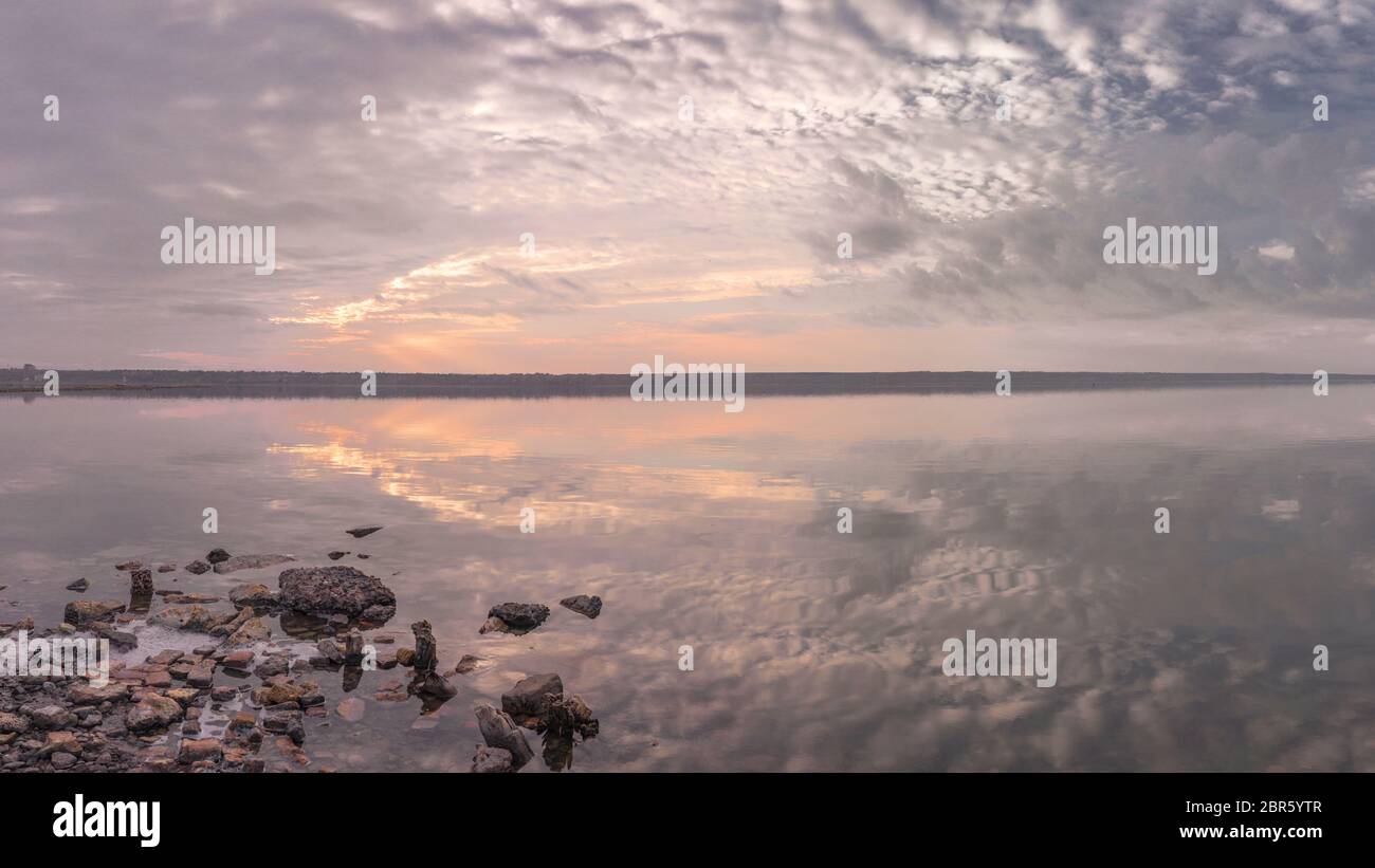 Wooden poles reflected in the water hi-res stock photography and images ...