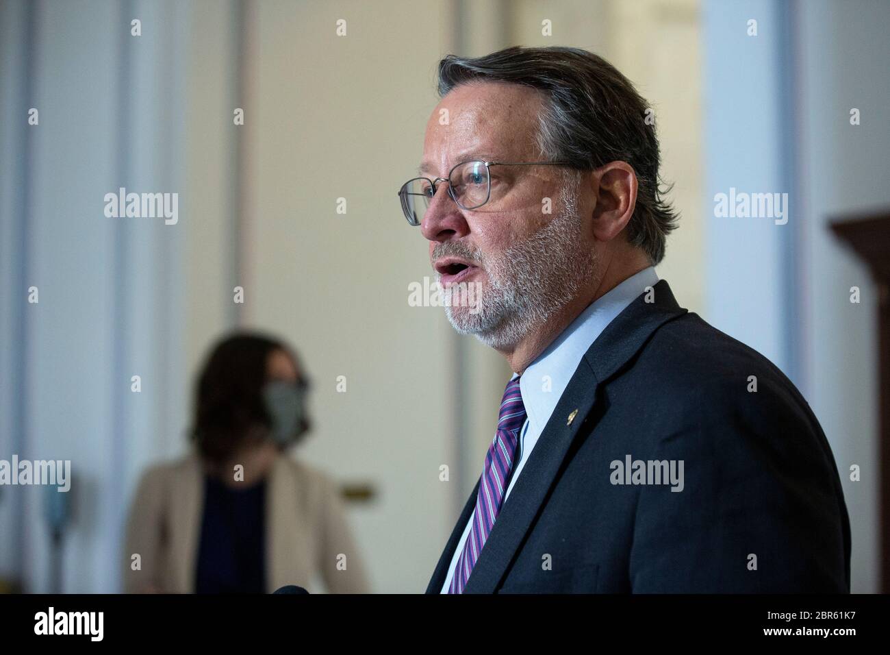 Washington, United States Of America. 20th May, 2020. United States Senator Gary Peters (Democrat of Michigan) speaks to members of the media following a U.S. Senate Committee on Homeland Security and Governmental Affairs meeting in the Senate Russell Office Building in Washington, DC, U.S., on Wednesday, May 20, 2020, to consider a motion to issue a subpoena to Blue Star Strategies. Credit: Stefani Reynolds/CNP Photo via Credit: Newscom/Alamy Live News Stock Photo