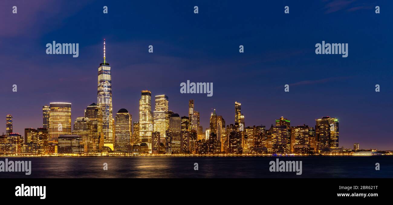 New York city Lower Manhattan skyline cityscape at dusk from New Jersey ...