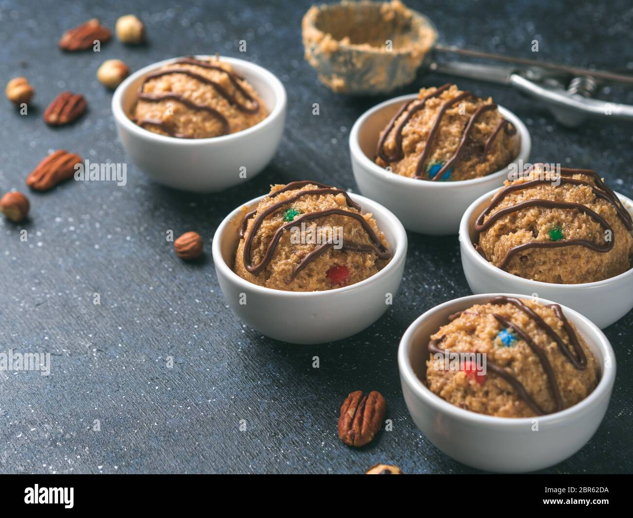 Safetoeat raw monster cookie dough in small portion bowl, ice cream