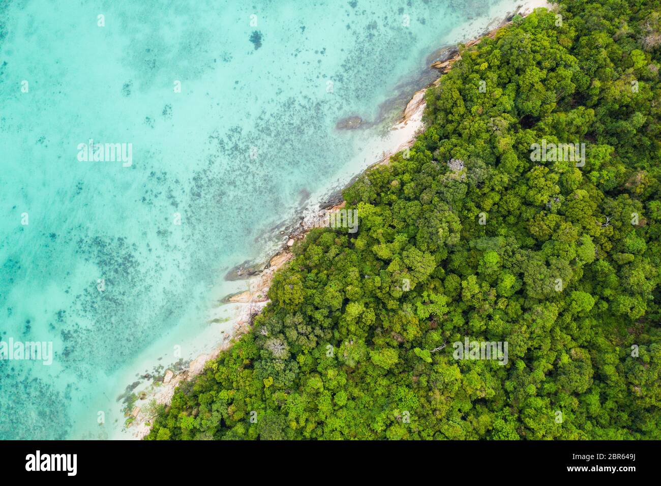 Aerial drone top view of the beautiful lagoon sea surface and tropical ...