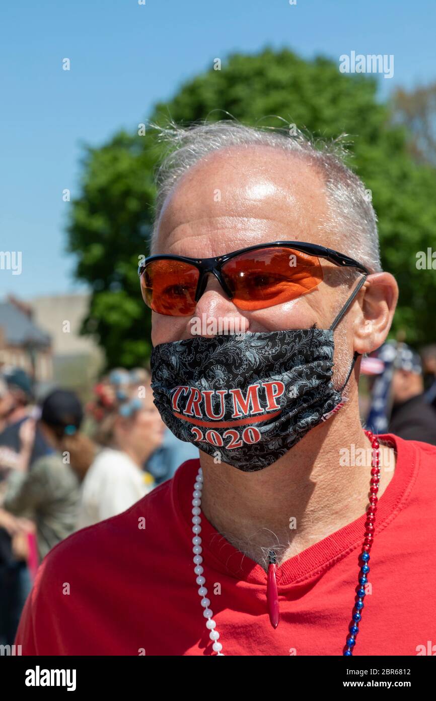Lansing, Michigan, USA. 20th May, 2020. A protest at the Michigan State Capitol against Governor Gretchen Whitmer's emergency orders closing many businesses during the coronavirus pandemic. The protest attracted mostly Trump supporters. Credit: Jim West/Alamy Live News Stock Photo