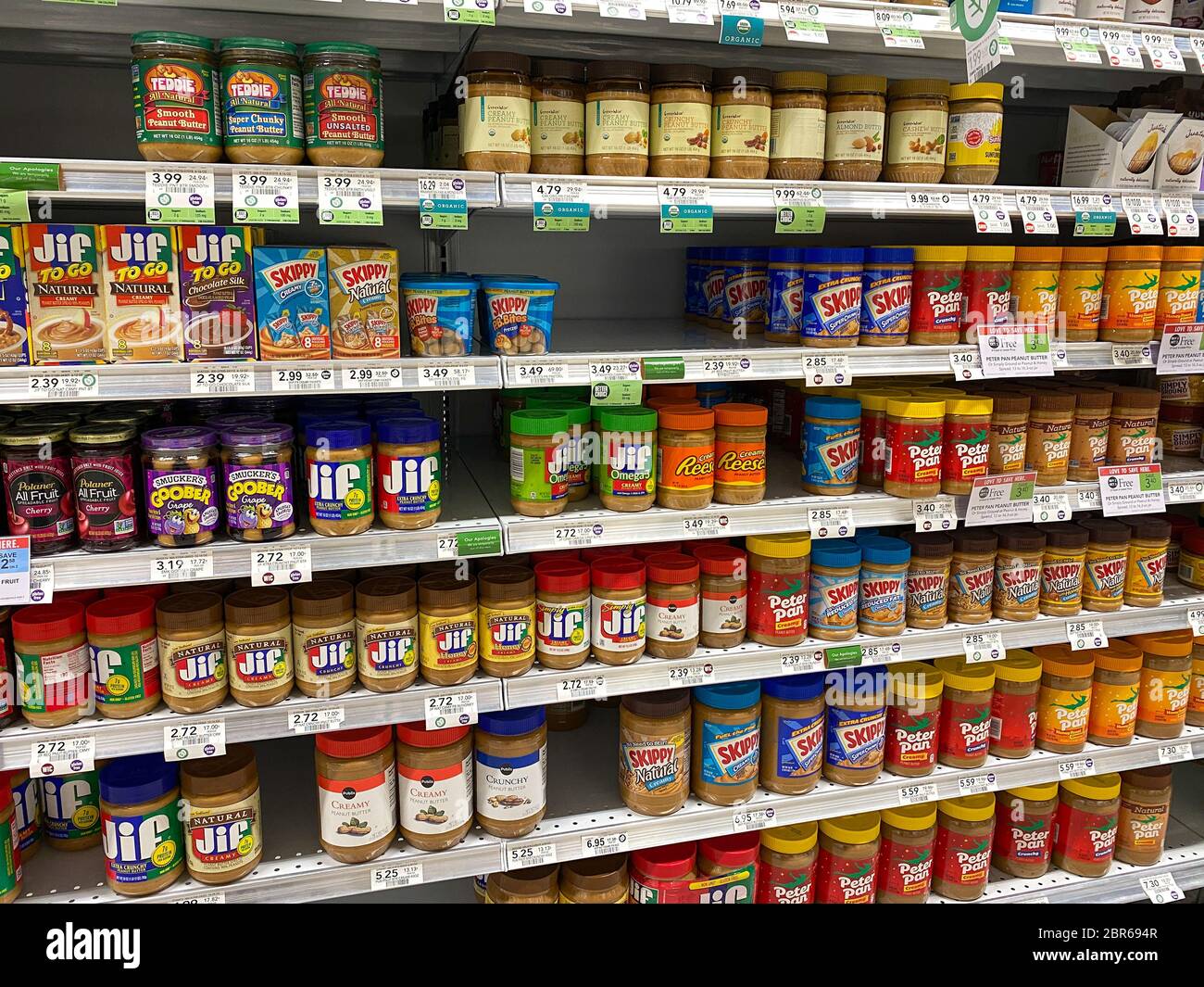 Orlando, FL/USA5/4/20 A display of jars of various Peanut Butter brands at a Publix grocery
