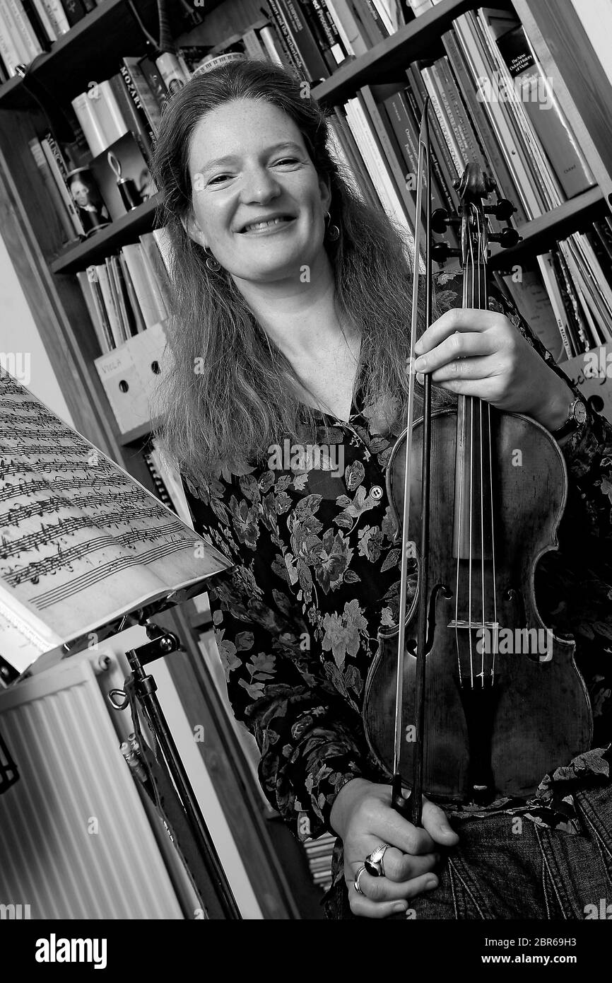 Rachel Podger, a British violinist and conductor specialising in the performance of Baroque music. pictured at home in Brecon Powys, Wales on  the 13t Stock Photo