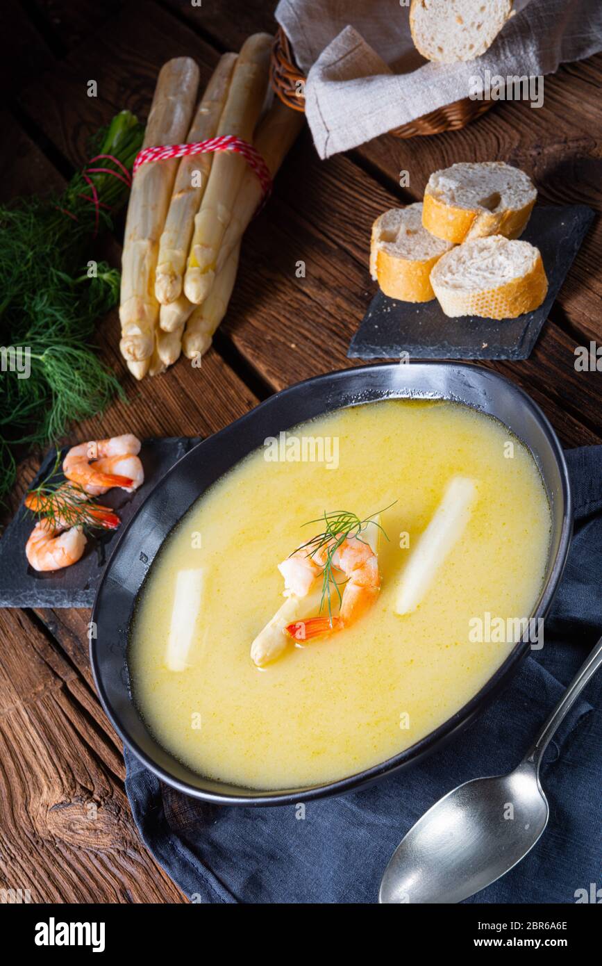 Super delicious asparagus soup with crab and capers Stock Photo - Alamy