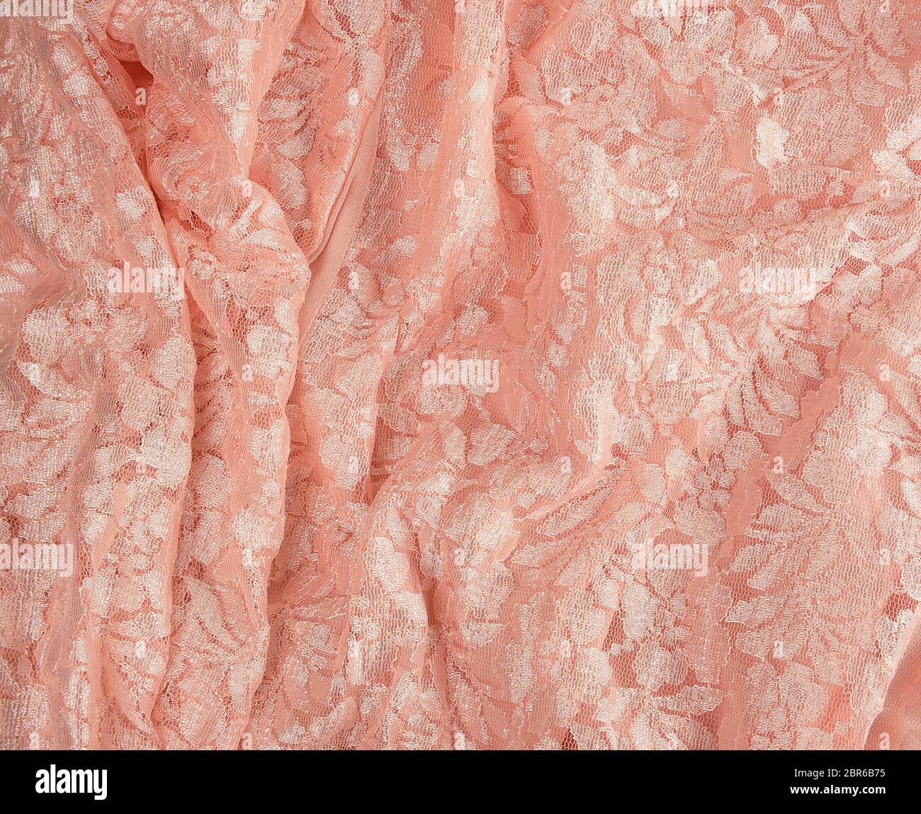 fragment of pink guipure, full frame, close up Stock Photo