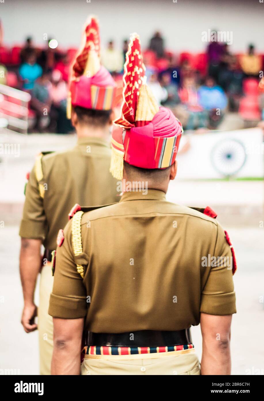 Portrait of an unrecognizable indian policeman standing in a row. Rear view. Stock Photo