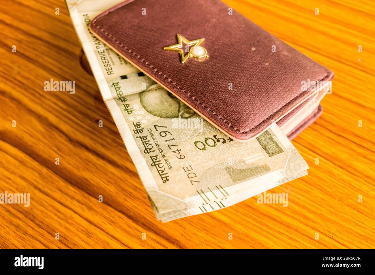Indian Five Hundred 500 Rupee Cash Note in Brown Color Wallet Leather Purse  on a Wooden Table. Business Finance Economy Concept Stock Image - Image of  economy, colored: 143041121