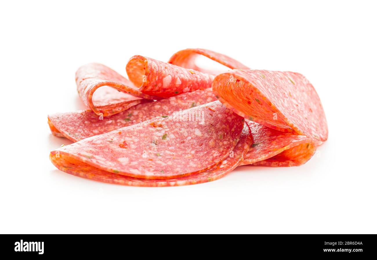 Salami smoked sausage slices with spice chili peppers isolated on white ...