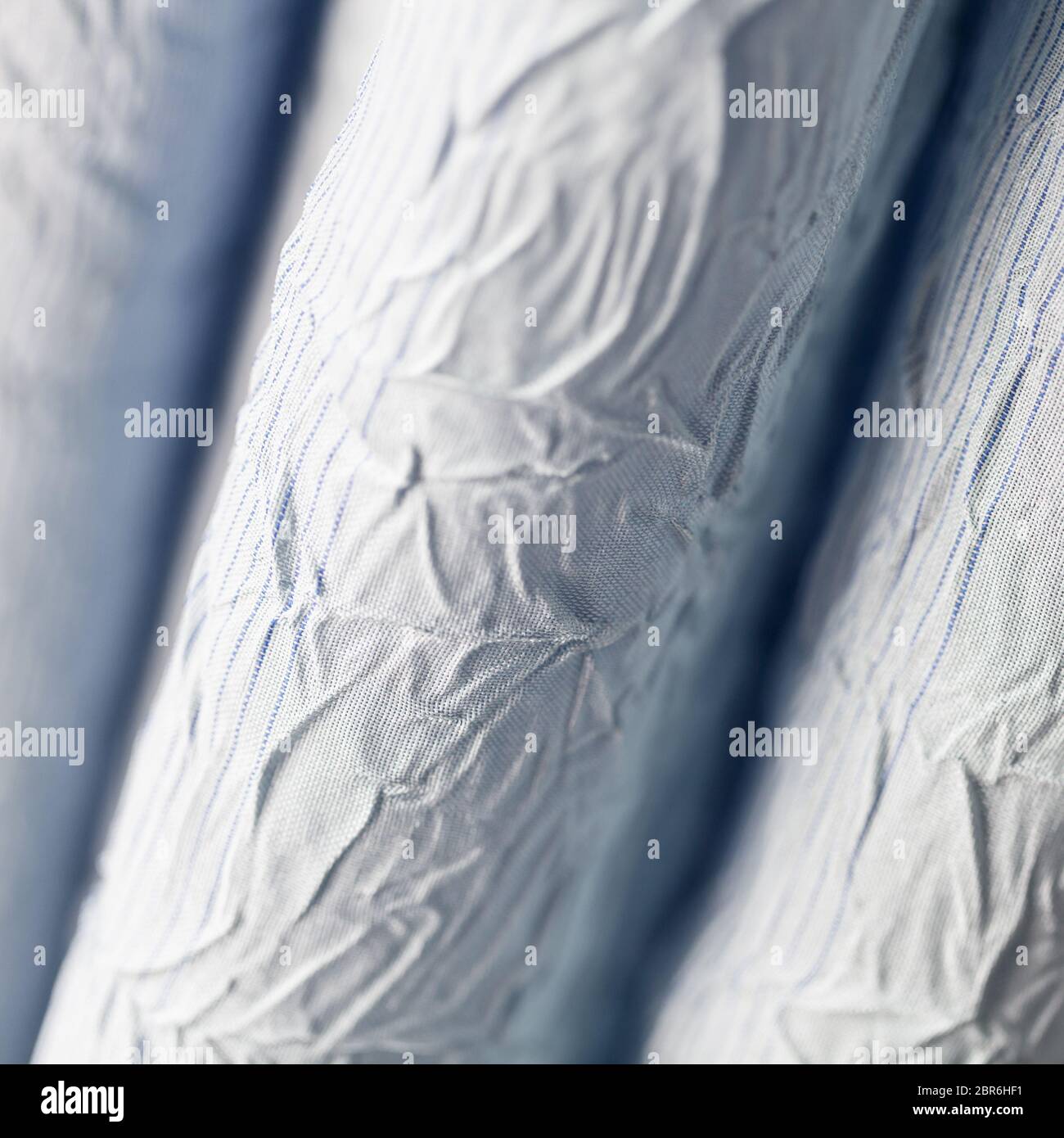 Natural crumpled fabric background photo with selective soft focus Stock Photo