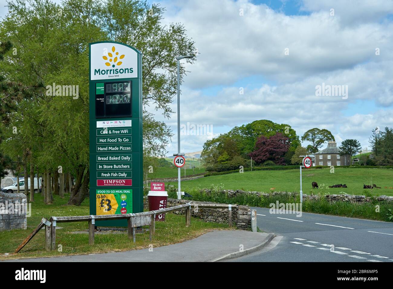 Sign showing Morrisons supermarket petrol/gas prices and store