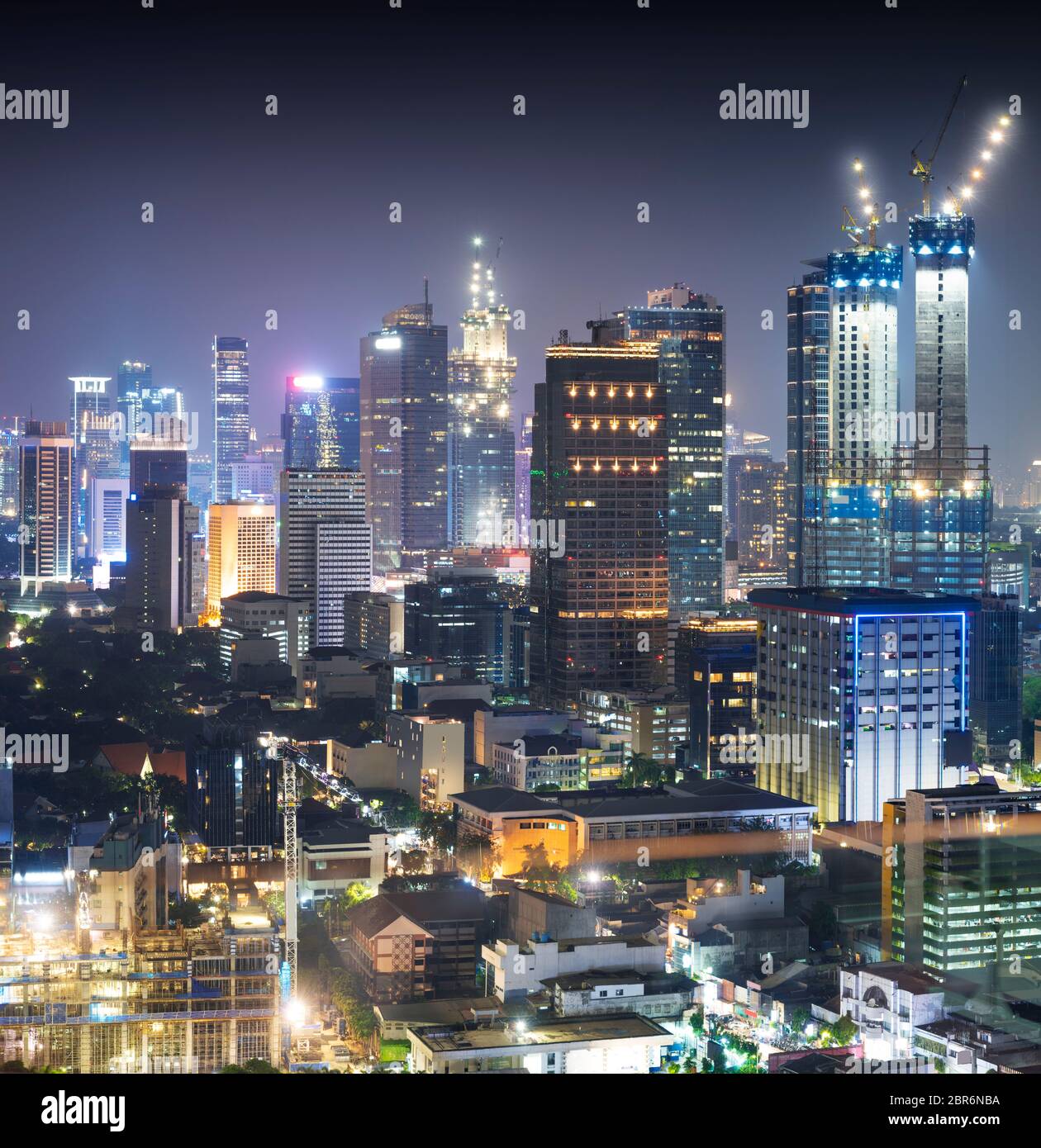 Jakarta city skyline with urban skyscrapers at night. Jakarta, Indonesia Stock Photo
