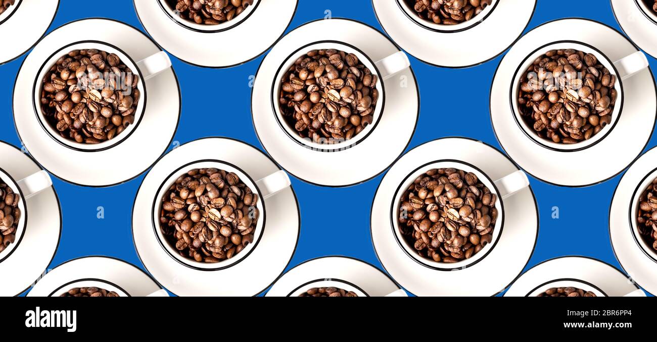 Seamless pattern with coffee beans in cups on blue background,panorama. Stock Photo