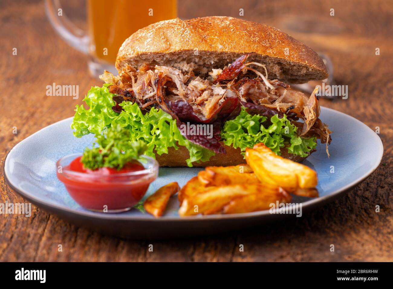 pulled pork in a bun with beer Stock Photo