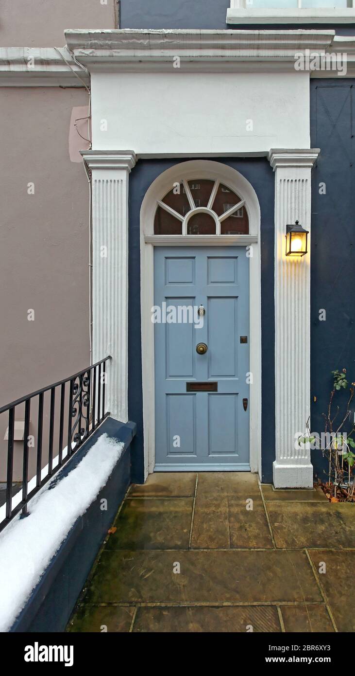 dark blue house light blue door