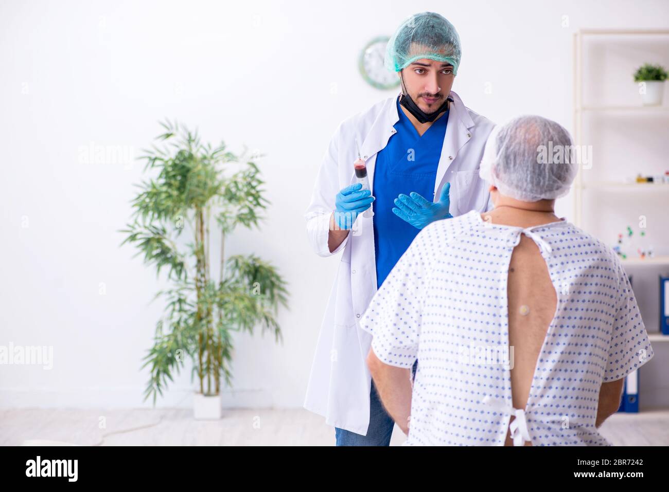 Doctor testing sick man covid hi-res stock photography and images - Alamy