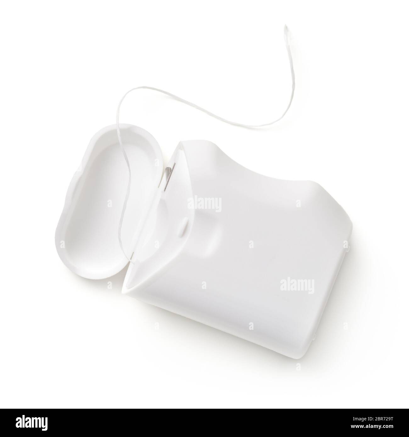 Dental floss container isolated on white background. Top view Stock