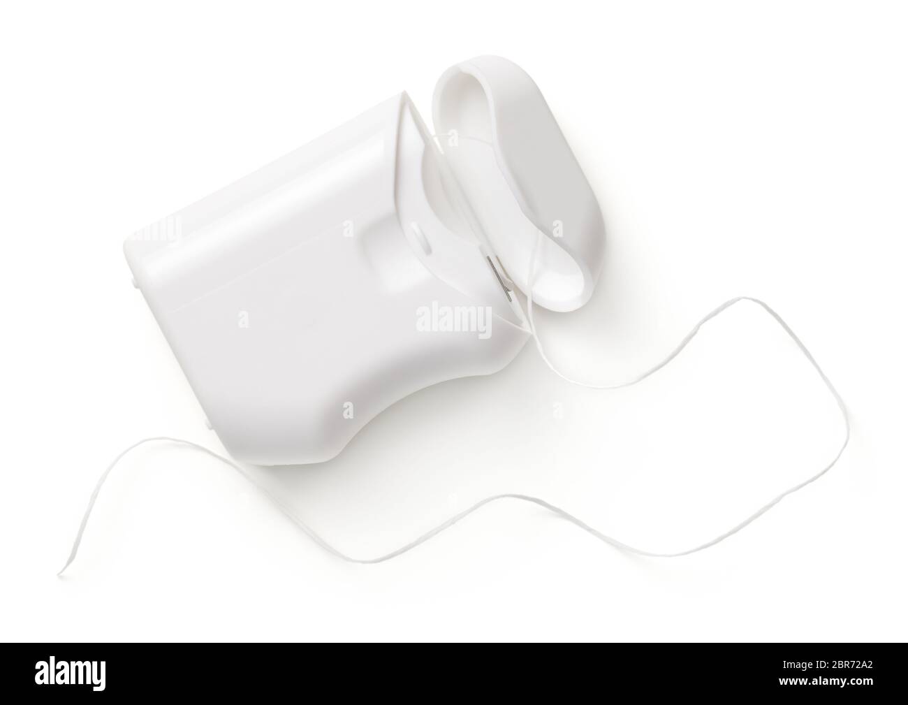 Dental floss container isolated on white background. Top view Stock