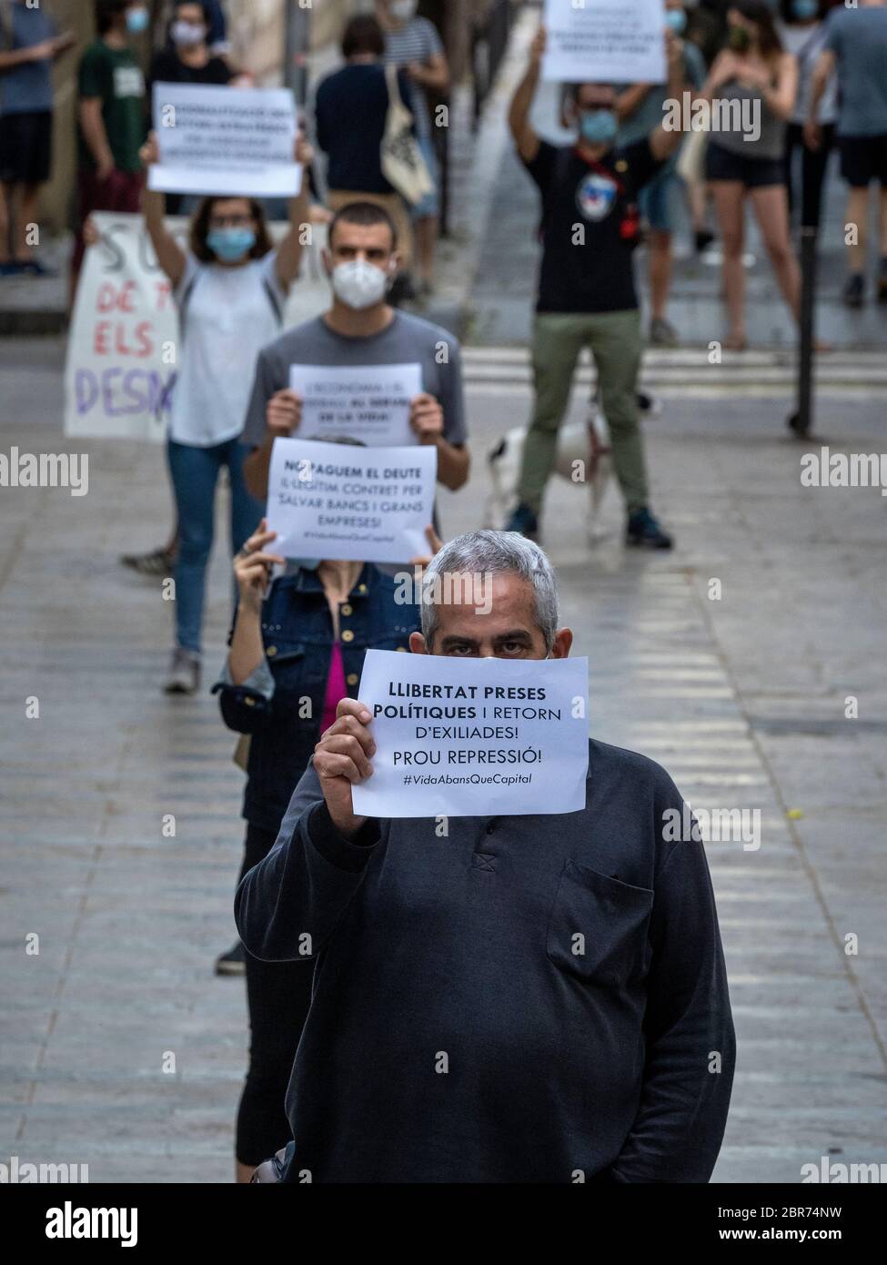 Barcelona, Spain. 20th May 2020. More than a hundred people demonstrated this Wednesday for the second consecutive afternoon in the center of the Gràcia district of Barcelona under the slogan 'Life before capital!'. Credit: dani codina/Alamy Live News Stock Photo