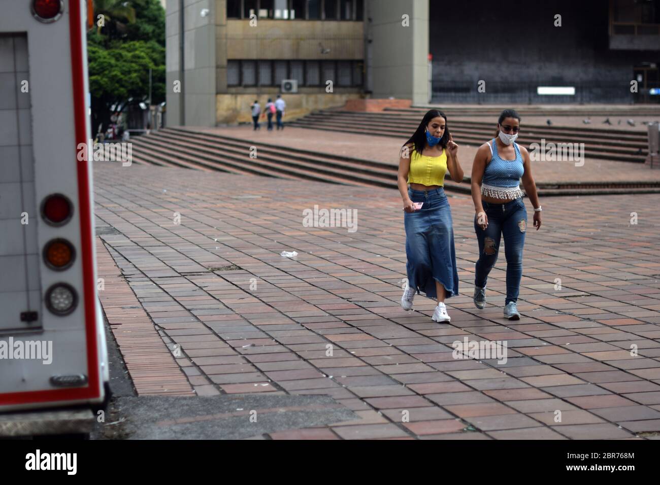 Couple of women walking the streets during Coronavirus outbreak in Colombia Stock Photo