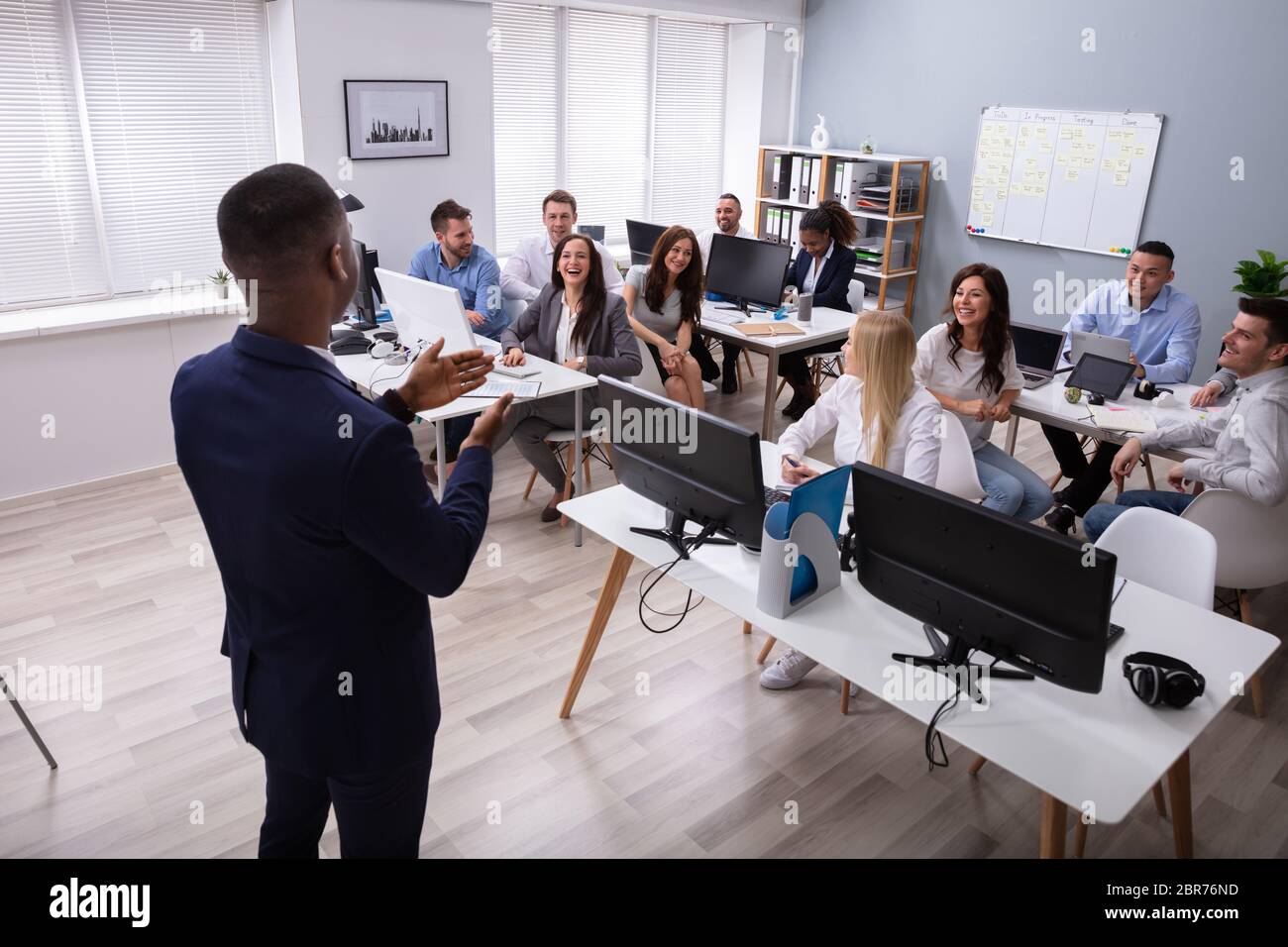 Diverse male colleagues giving hi-res stock photography and images - Alamy