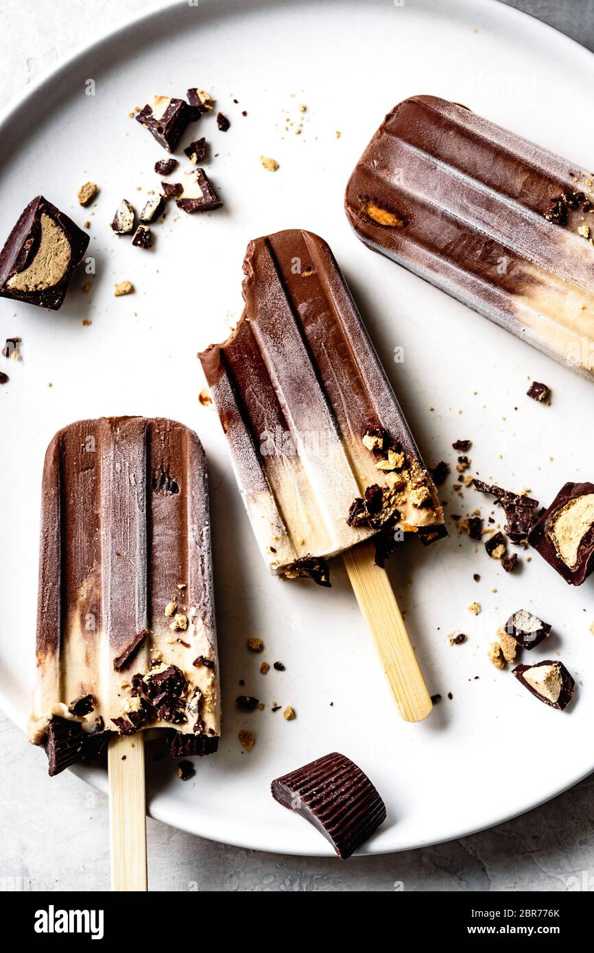 Peanut butter and chocolate fudge popsicles. Stock Photo