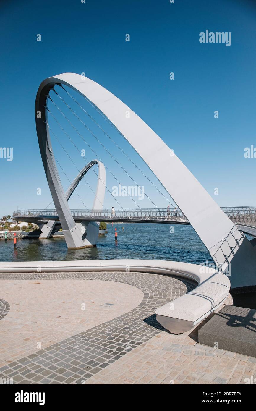 Vertical shot of Queen Elizabeth Quay Bridge in Peth with unrecognizable people crossing over. Stock Photo