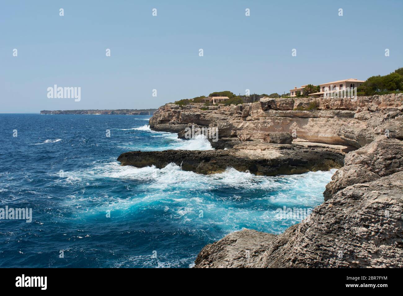 Small Lighthouse on Mallorca torre porto petro, water activities Stock Photo