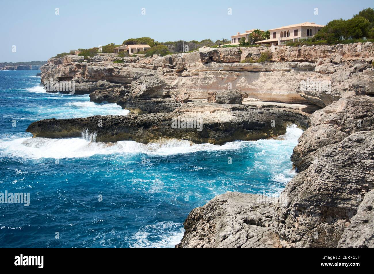 Small Lighthouse on Mallorca torre porto petro, water activities Stock Photo