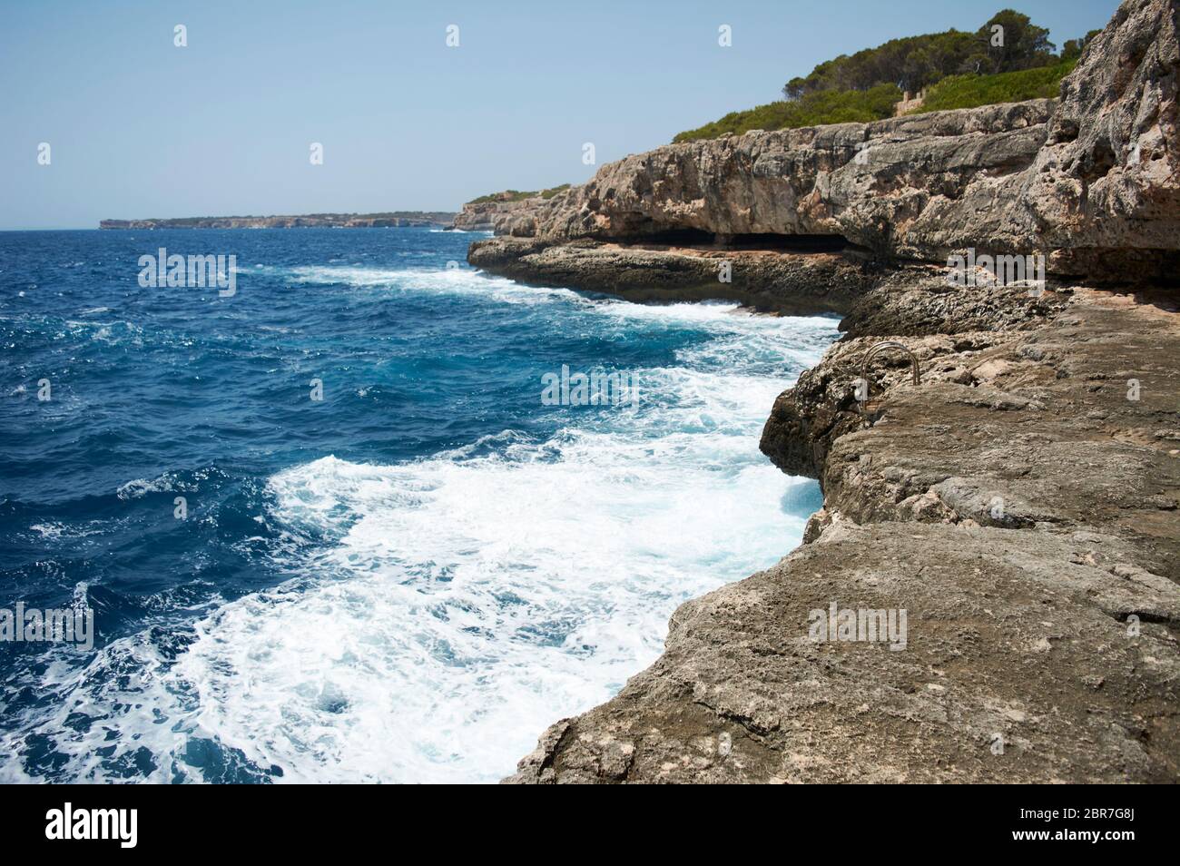 Small Lighthouse on Mallorca torre porto petro, water activities Stock Photo